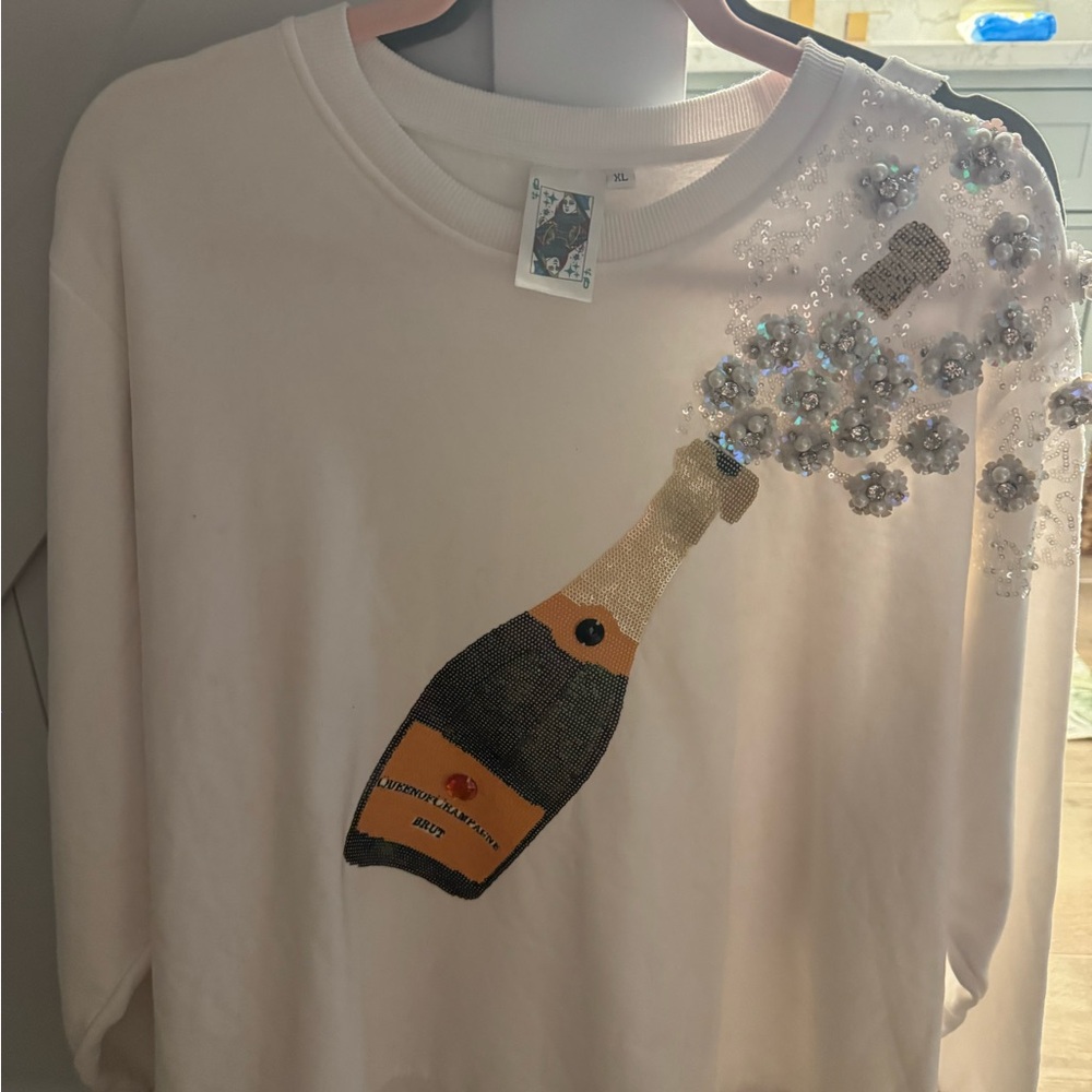 QUEEN OF SPARKLES White Sweatshirt with Champagne Bottle Design - Picture 2 of 6